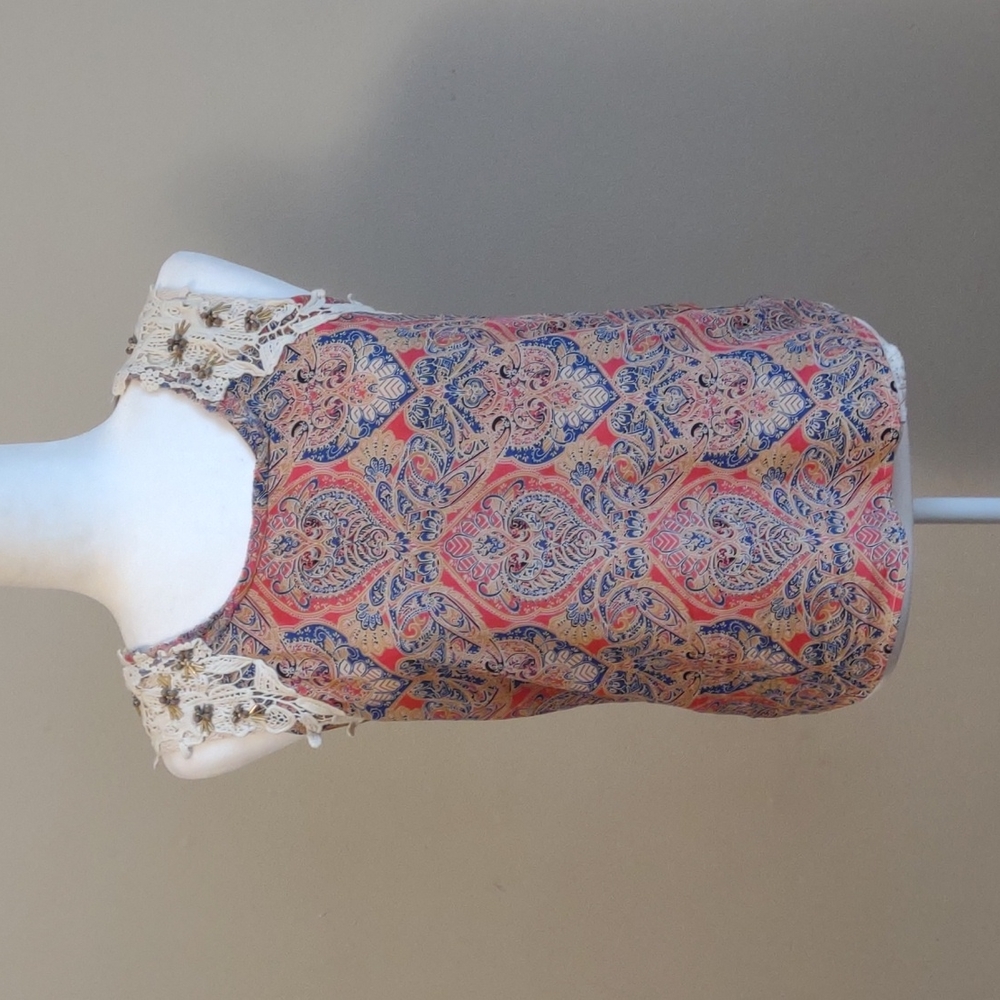Miss Me sleeveless pullover top‎ with crocheted and beaded detail. Lined.…